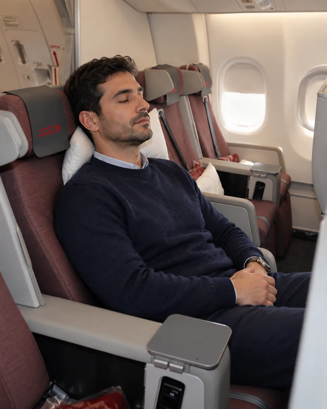 Passager installé en Premium Économie